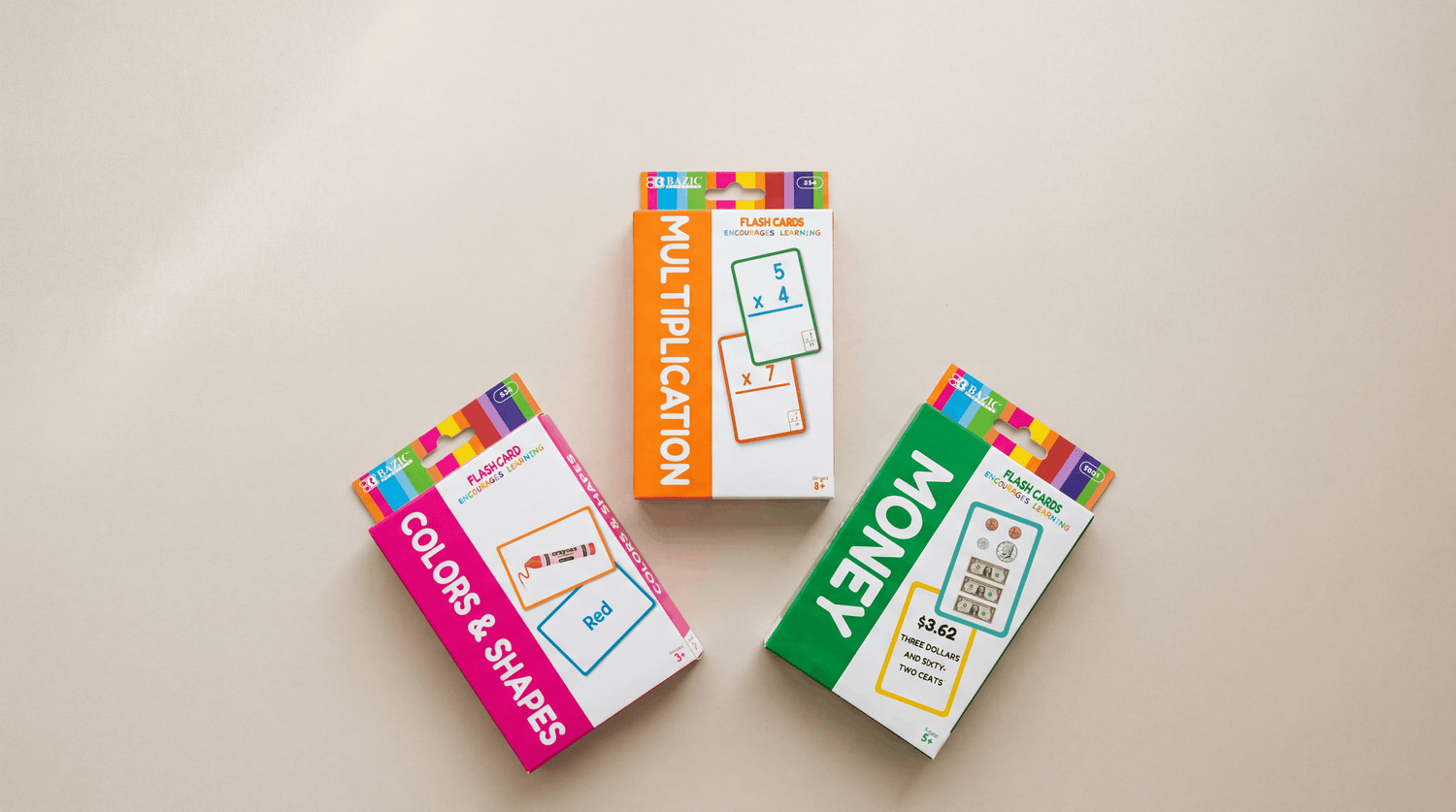 Sealed BAZIC Money, Multiplication, and Colors & Shapes flash card packs in a flat lay on a light surface.
