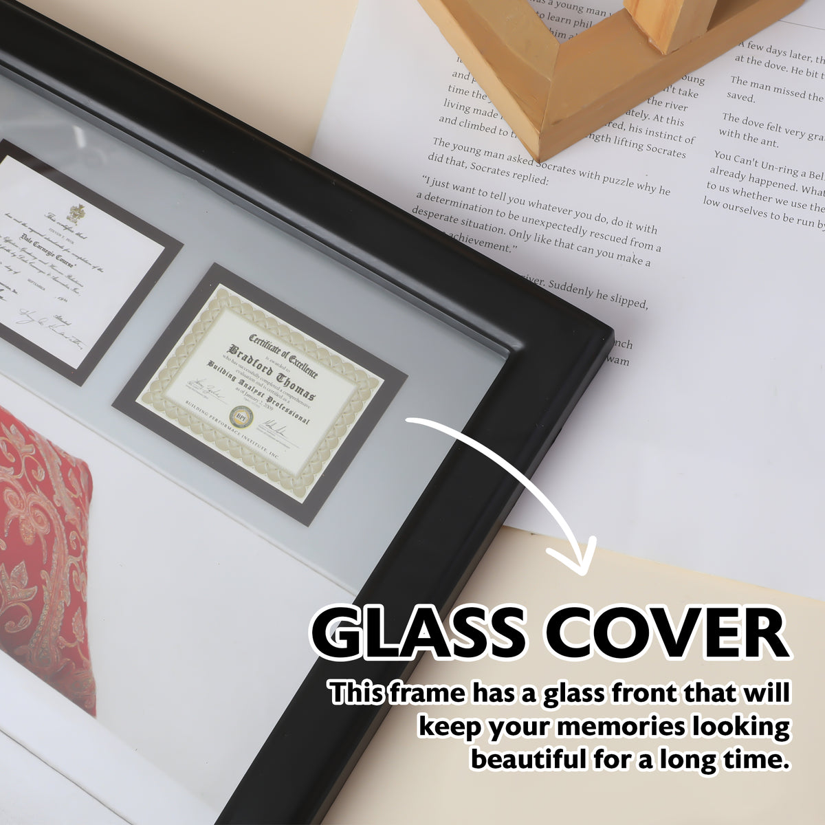 Black frame with glass cover; text says the glass front keeps your memories looking beautiful for a long time.