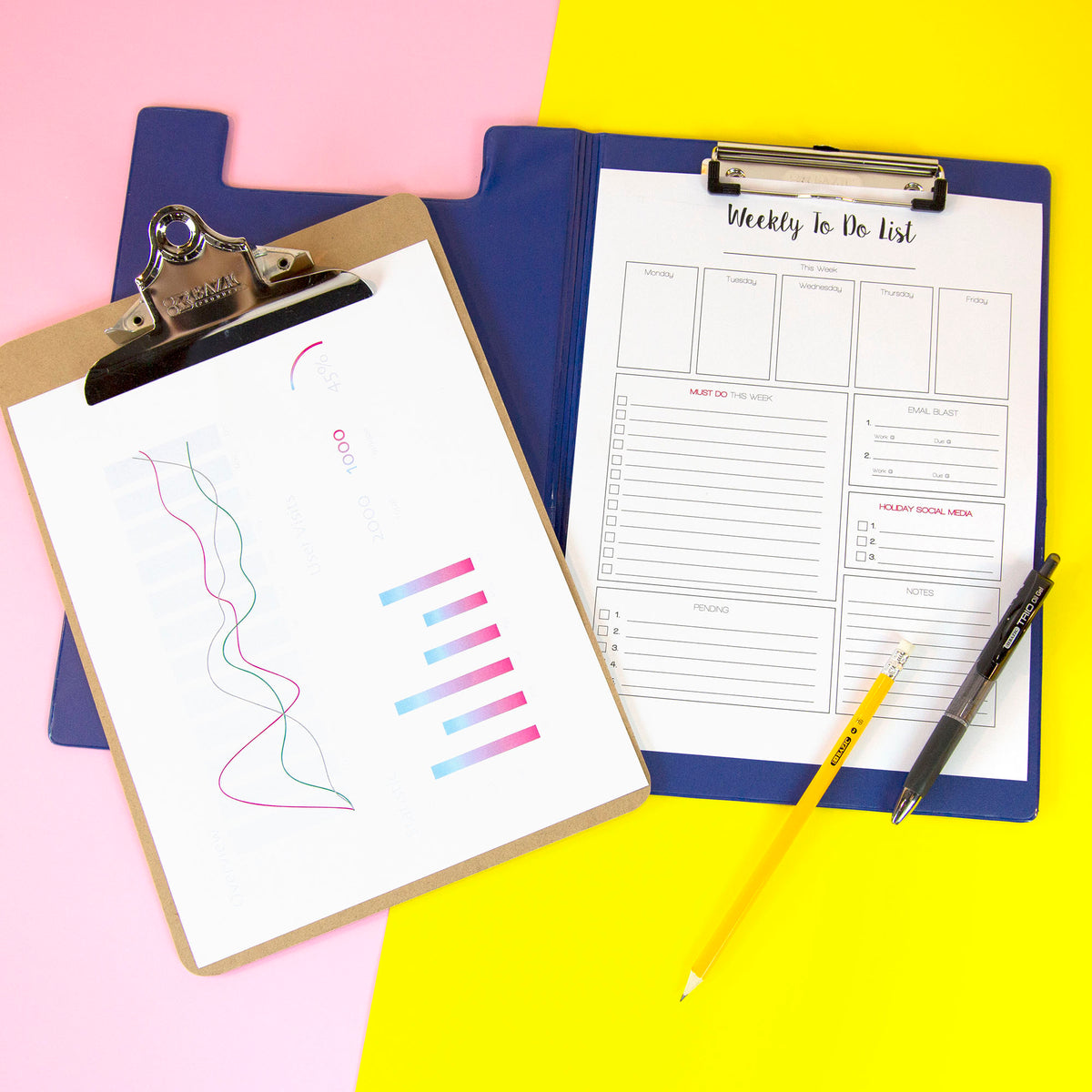 Open blue clip folder holds a weekly to-do list beside a brown clipboard with charts, a yellow pencil and a black pen.
