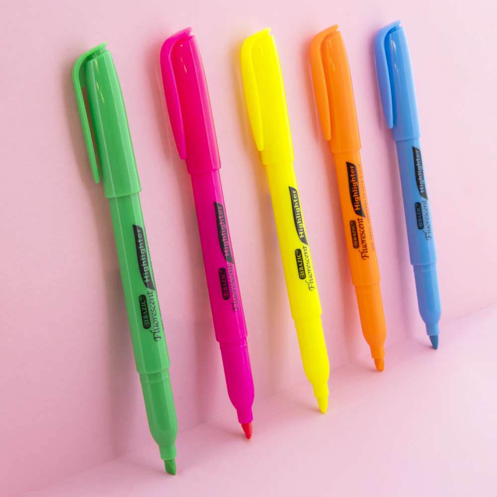 Five highlighters in green, pink, yellow, orange and blue, with exposed chisel tips and clip caps posted on the ends.