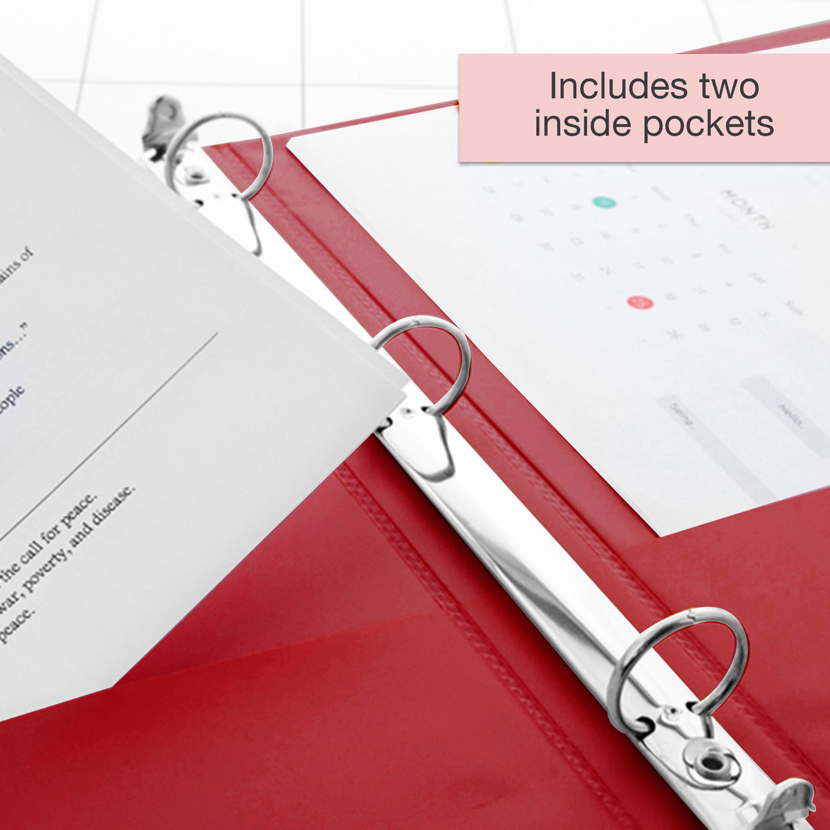 Open red binder with three silver round rings and papers; includes two inside pockets.