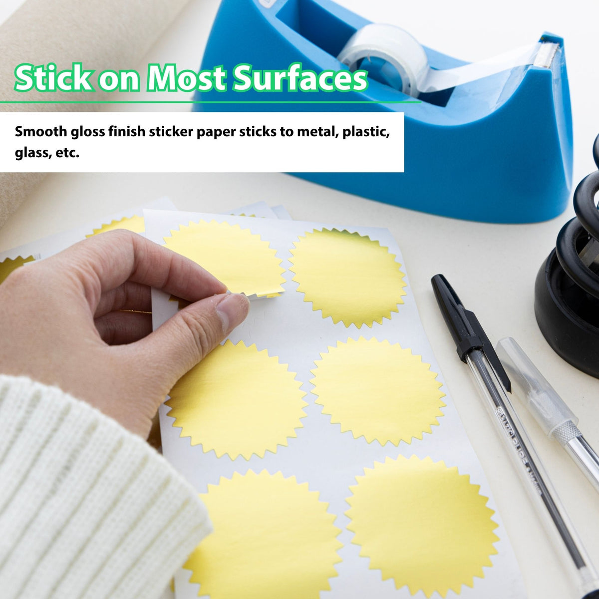 Hand peeling a gold burst seal. Smooth gloss sticker paper sticks to most surfaces, including metal, plastic and glass.