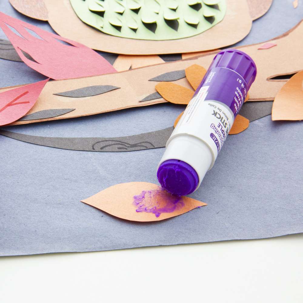Applying Purple Glue Stick To White Paper Stock Photo, Picture and Royalty  Free Image. Image 32052565.